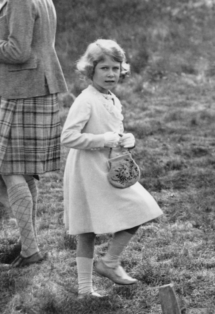 The future Queen Elizabeth II at Abergeldie Castle in Scotland at the age of seven, 1933. (Photo by Central Press/Hulton Archive/Getty Images)