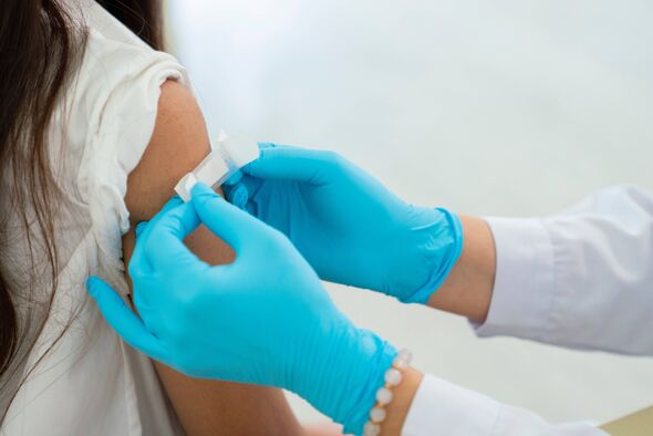 Doctor applies bandage Doctor applies bandage