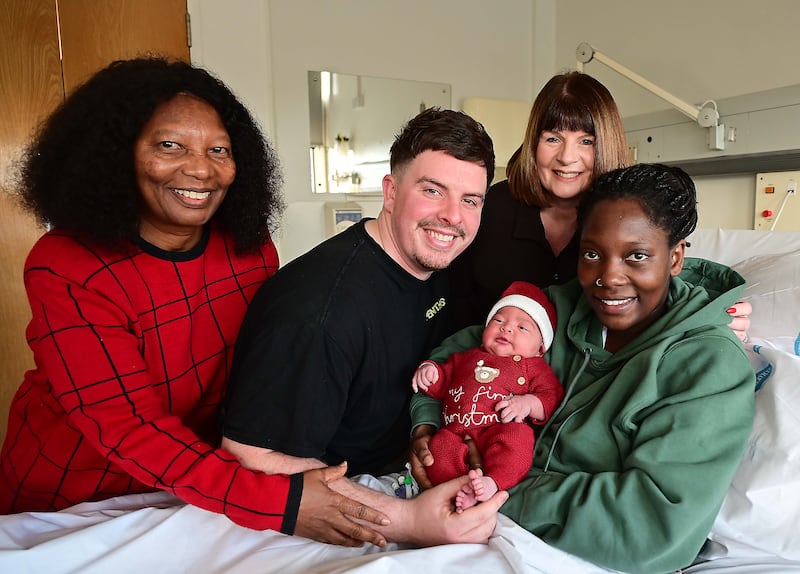 Pacemaker Press 25-12-2025:  Several babies were born on Christmas Day at the Royal Victoria Hospital (RVH) in Belfast.  including Mom Margaret Watiri and baby girl (8lb11oz) that was born at 3.36 am pictured with dad Dad Chris McKenna  and grandmotherÕs Esther McKenna and Josephine Goedert.
Picture By: Arthur Allison/Pacemaker Press.
Phone 07843415487
