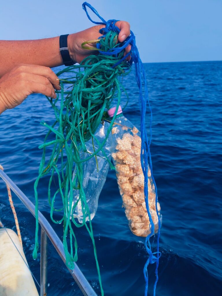 A hand holding a Ghost FAD