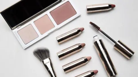 Carlos Avila Gonzalez/The San Francisco Chronicle via Getty Images Sephora cosmetics including a blush palate, mascara, lipstick and a blush brush is shown. They are in a pink-ish / nude colour called Marsala which was picked as Pantone's colour of the year in 2015