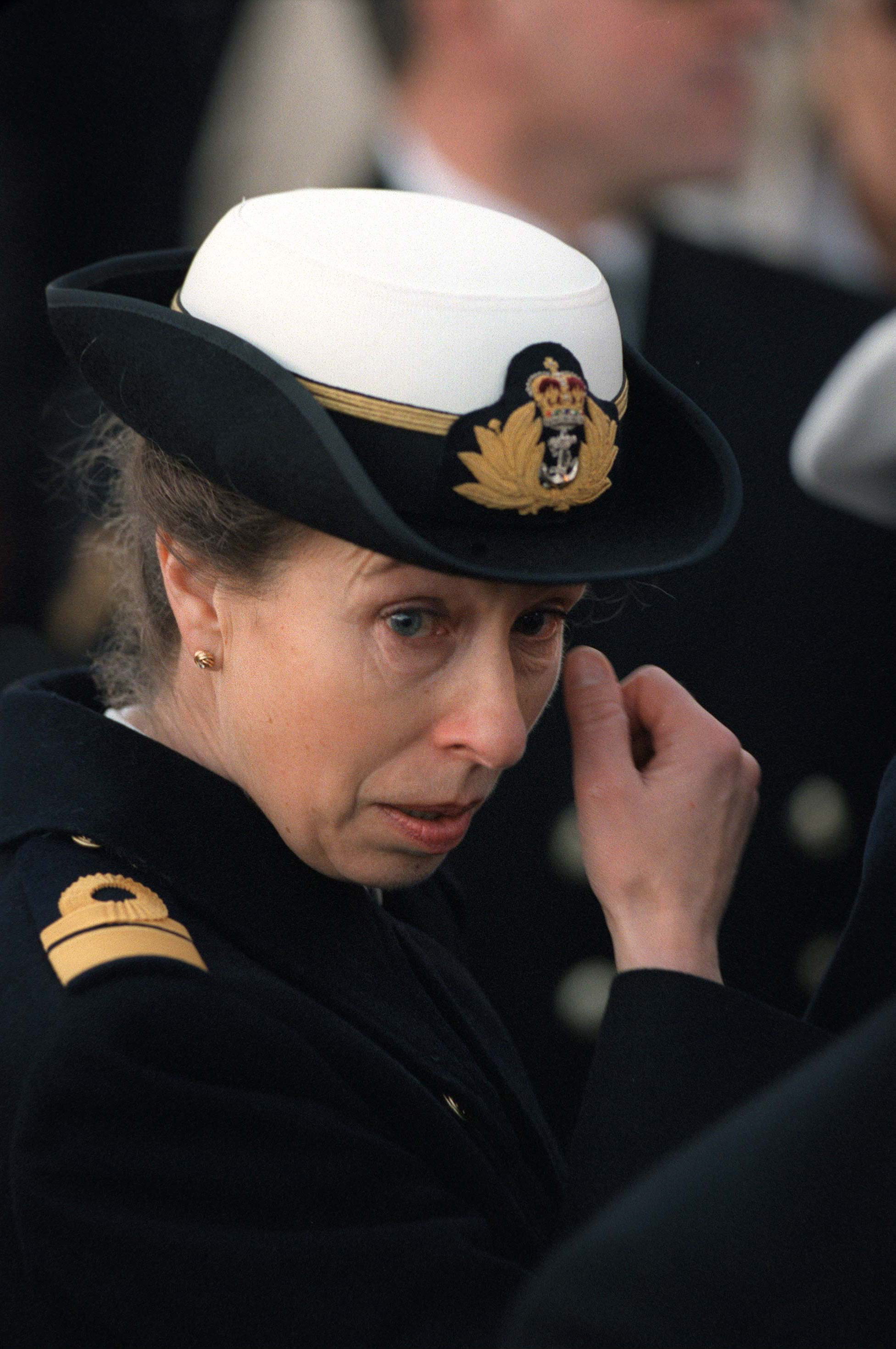 Princess Anne wiping away a tear