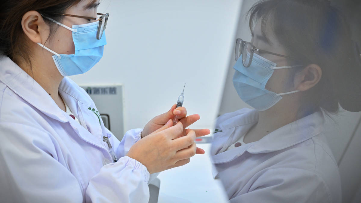 Chemists warn of vaccine shortage as super-flu sweeps through Britain