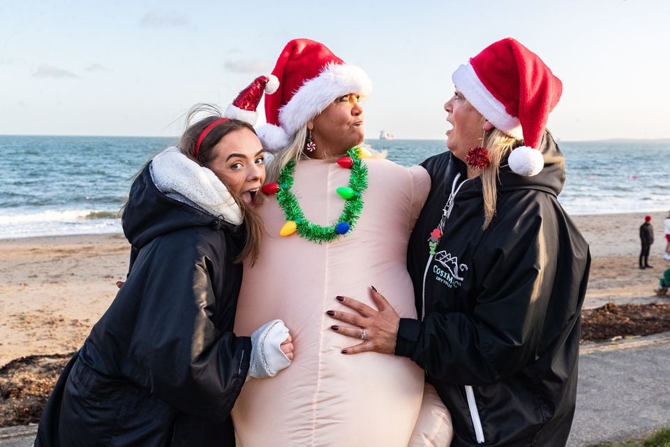 Shannon Johnson, Karen Millar and Nikki Watson at the Christmas Eve dip at Helen’s Bay on 24th December 2025 (Luke Jervis/Belfast Telegraph)