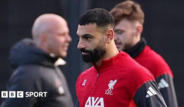 Mohamed Salah wearing a Liverpool training top