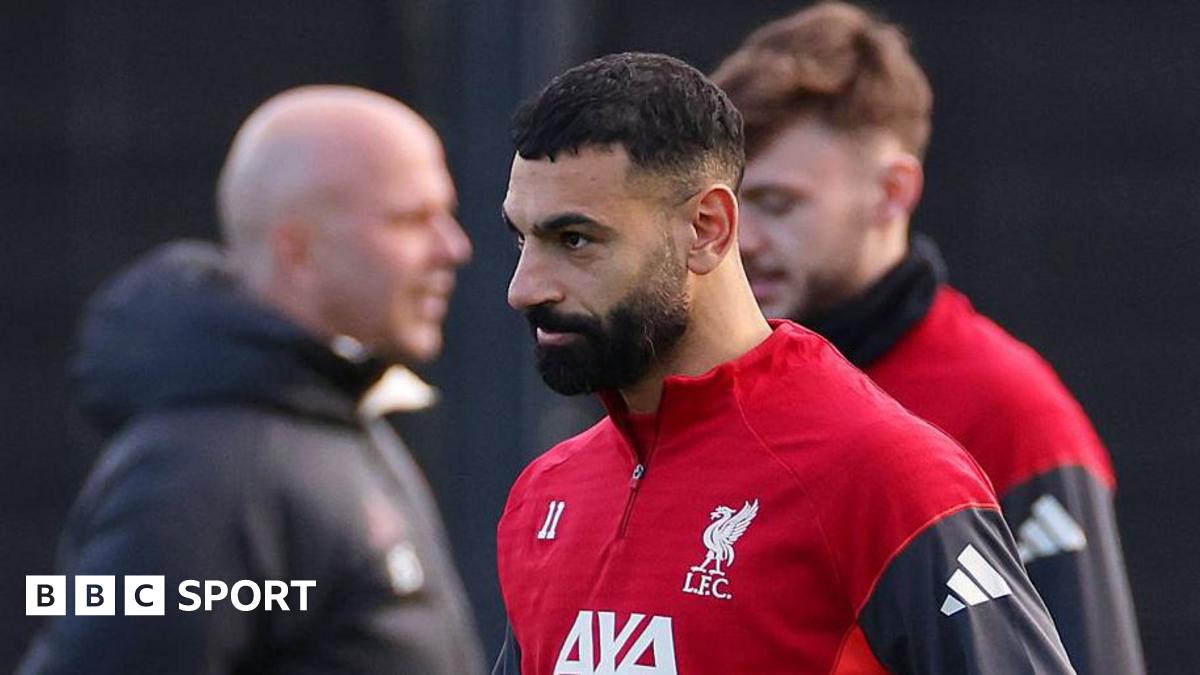 Mohamed Salah wearing a Liverpool training top