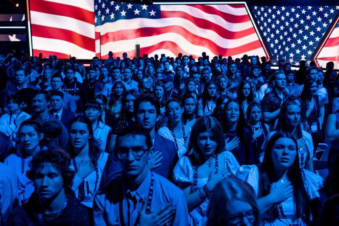 MAGA supporters sang the national anthem during AmericaFest, the first Turning Point USA summit since the death of Charlie Kirk, in Phoenix, Arizona, on December 20, 2025.