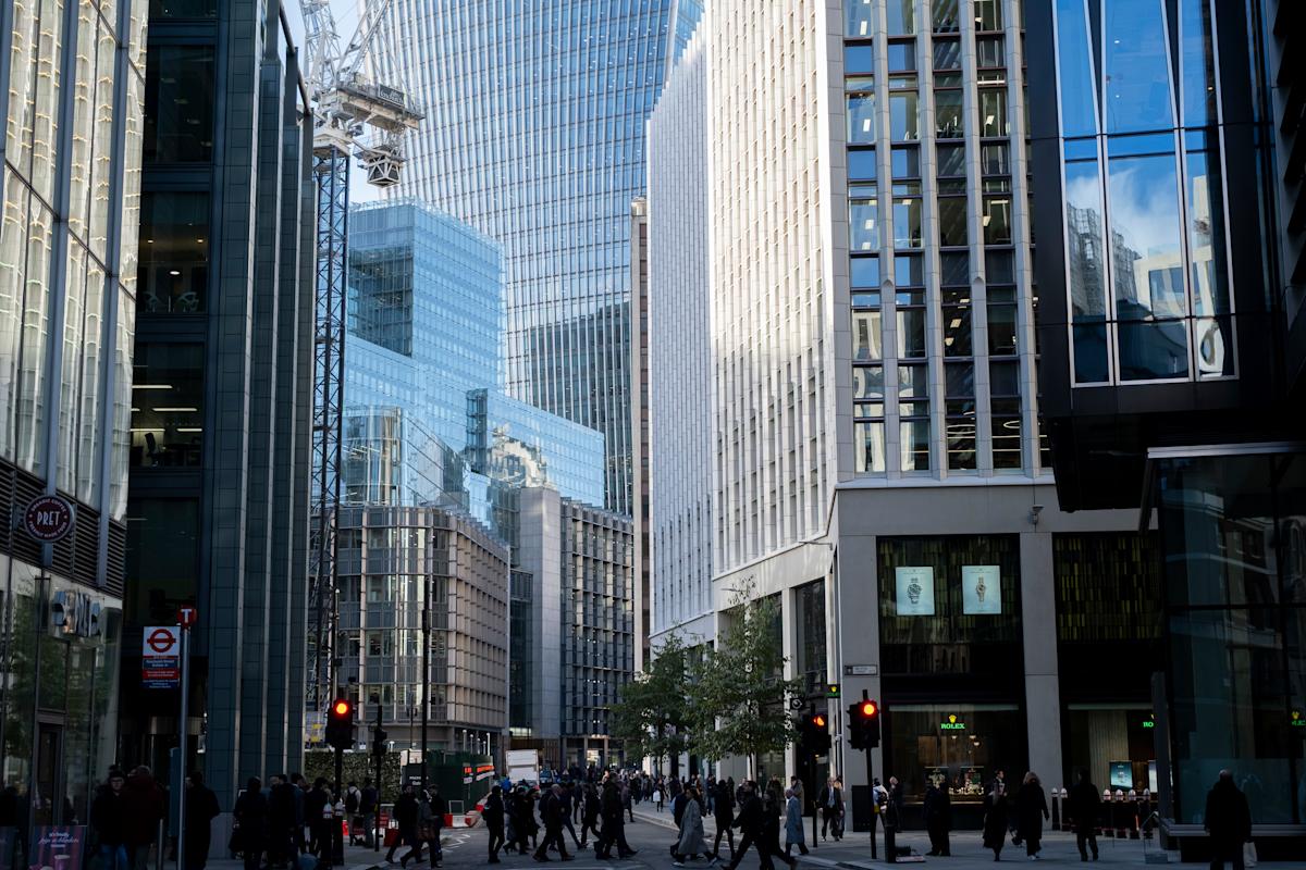 Wall Street slips and London climbs as traders await US Federal Reserve interest rate decision