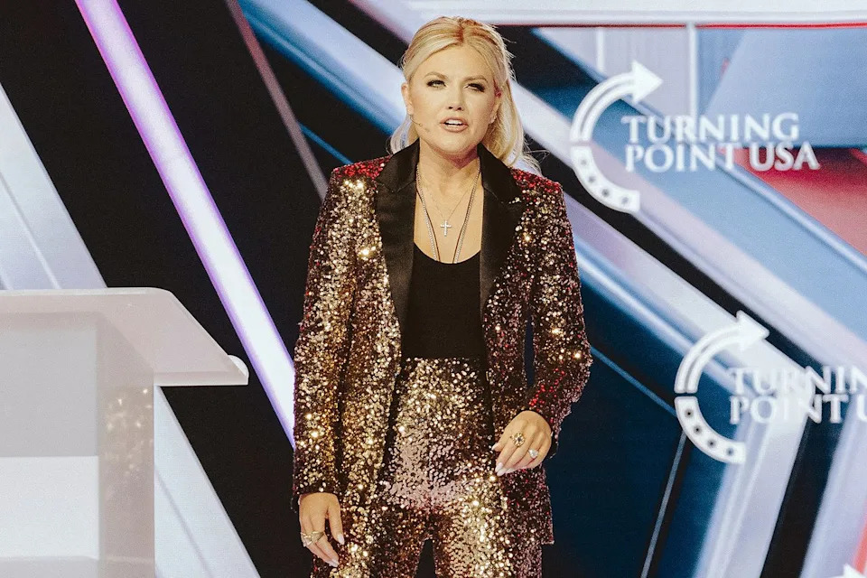 Olivier Touron / AFP via Getty Erika Kirk at the Turning Point AmericaFest conference on Dec. 18.