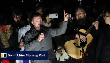 Hundreds join Tommy Robinson’s far-right rally in London: ‘Make Christmas Great Again’