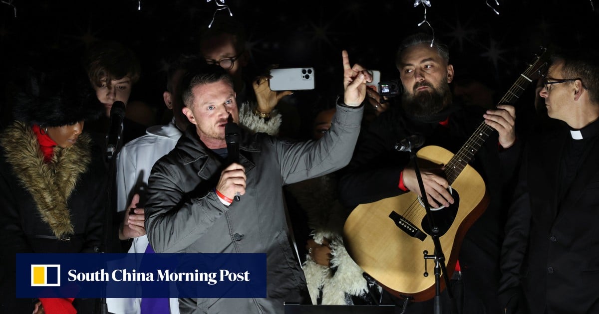 Hundreds join Tommy Robinson’s far-right rally in London: ‘Make Christmas Great Again’