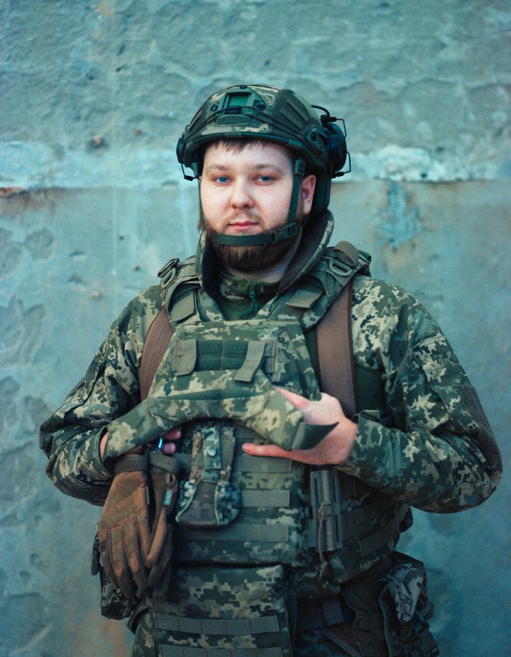 Denys, 23.  “Until the day I signed the contract, I was mentally preparing myself all the time... I was going through all sorts of events to improve my knowledge in medicine, shooting, and so on. I came home one day and there was a massive shelling. Shaheds were flying , and then something stooped me. I thought I had to put an end to it, so I joined the army the next day. “  November 2025. Photo by Joshua Olley/UNITED24 Media.
