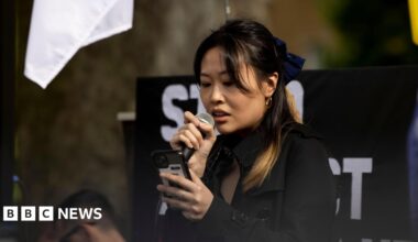 Carmen Lau, activist in exile and former Pro-democratic District Councilor of Hong Kong, seen making speeches during the rally outside Downing Street in 2022.