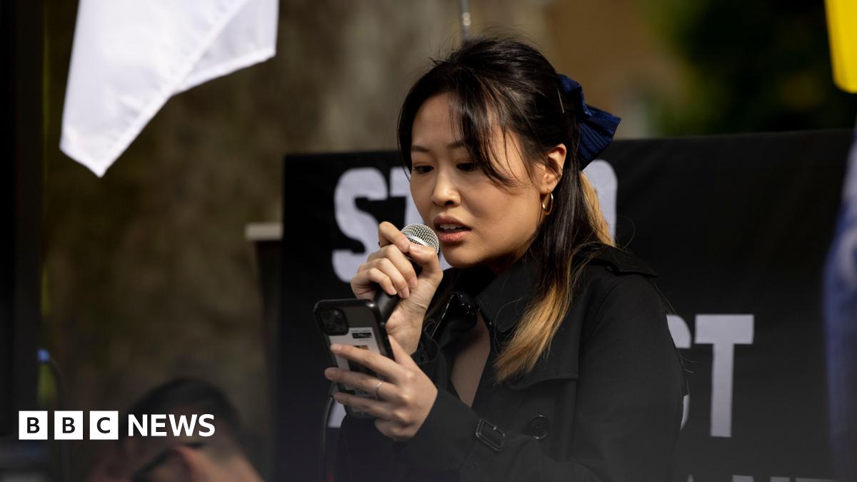 Carmen Lau, activist in exile and former Pro-democratic District Councilor of Hong Kong, seen making speeches during the rally outside Downing Street in 2022.