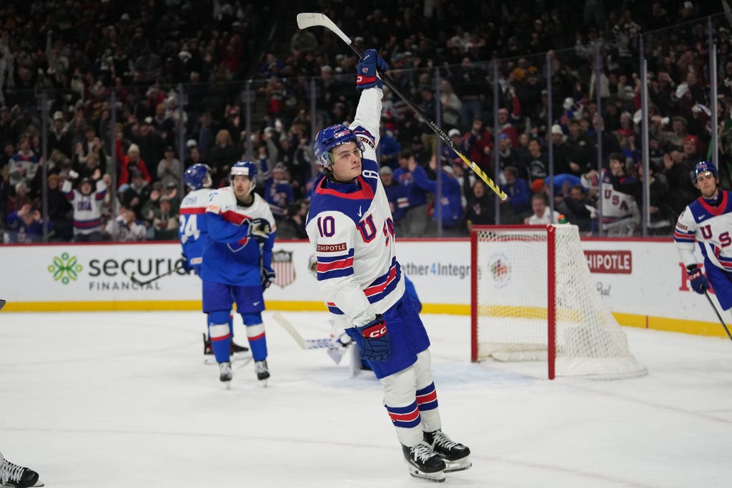 United States forward James Hagens (10) celebrates after scoring during the second period of an IIHF World Junior Hockey Championship game against Slovakia, Monday, Dec. 29, 2025, in St. Paul, Minn.