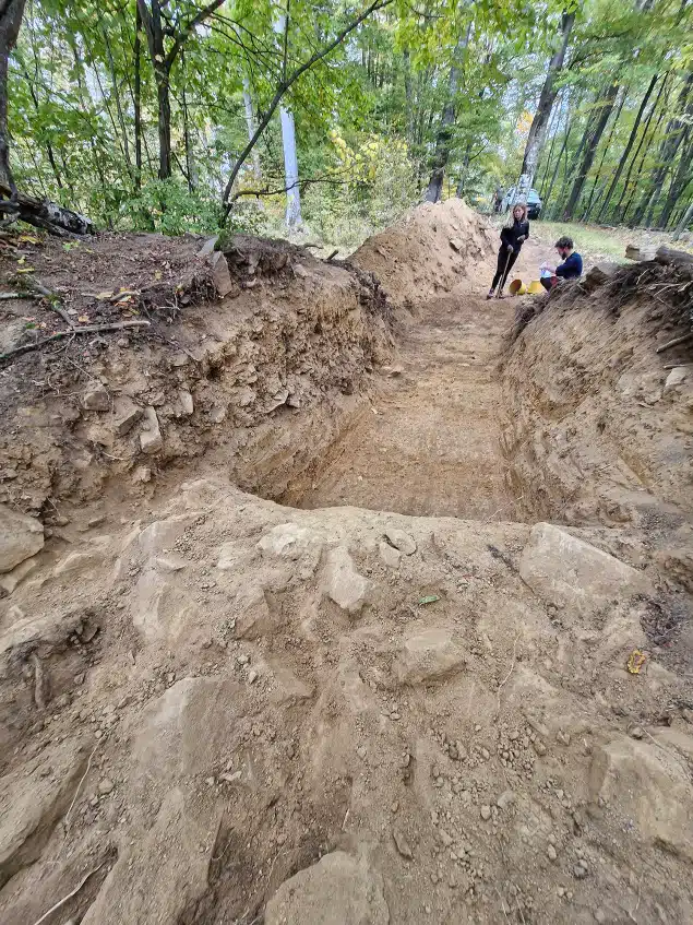 Archaeologists Excavating The Gradina Site In The Papuk Mountains, Revealing Ancient Fortifications With Visible Stone Layers.