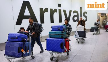 FILE PHOTO: People with luggage arrive at Terminal 4 of the Heathrow International Airport, a day after a fire at a nearby electrical substation wiped out the power at the airport, near London, Britain, March 22, 2025. REUTERS/Isabel Infantes/File Photo (Representative Image)