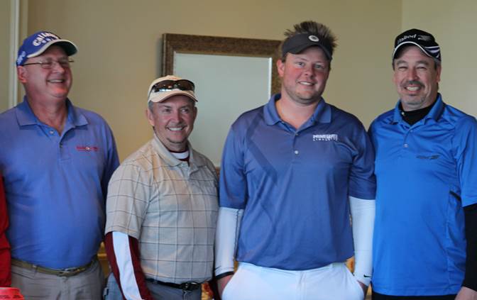 (From left) Ron Beckner, The Kloke Group/United Van Lines; Bob Goeddel, Bobby G’s Disc Jockeys; Jamie Gravett, S.W. Rodgers Company, Inc. and Larry Peterman, The Kloke Group/United Van Lines—winning team on the back 9 of the course.