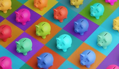 Array of piggy banks in saturated colours on high colour contrast background