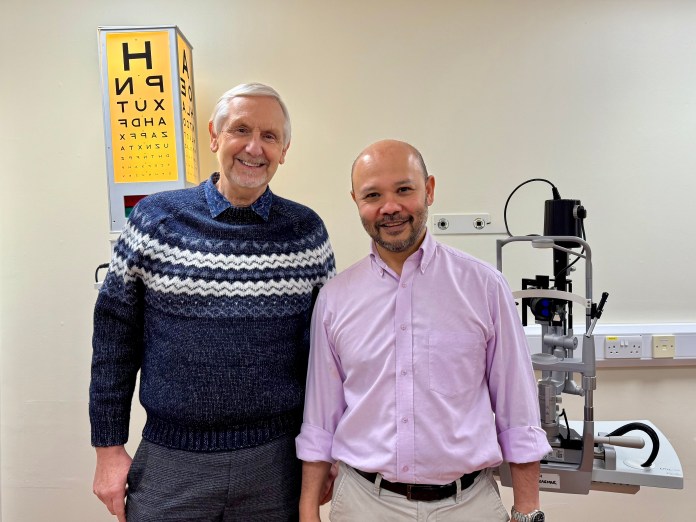 An image of David Watkins (L) standing alongside his surgeon, Dr Tint, in the clinic.
