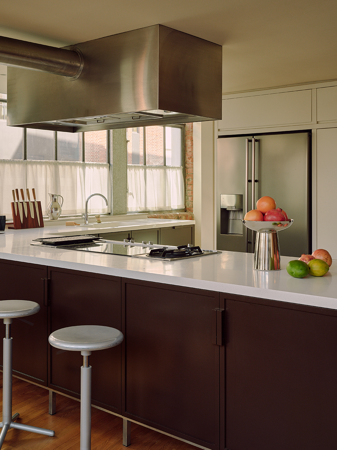 dark brown and stainless steel kitchen