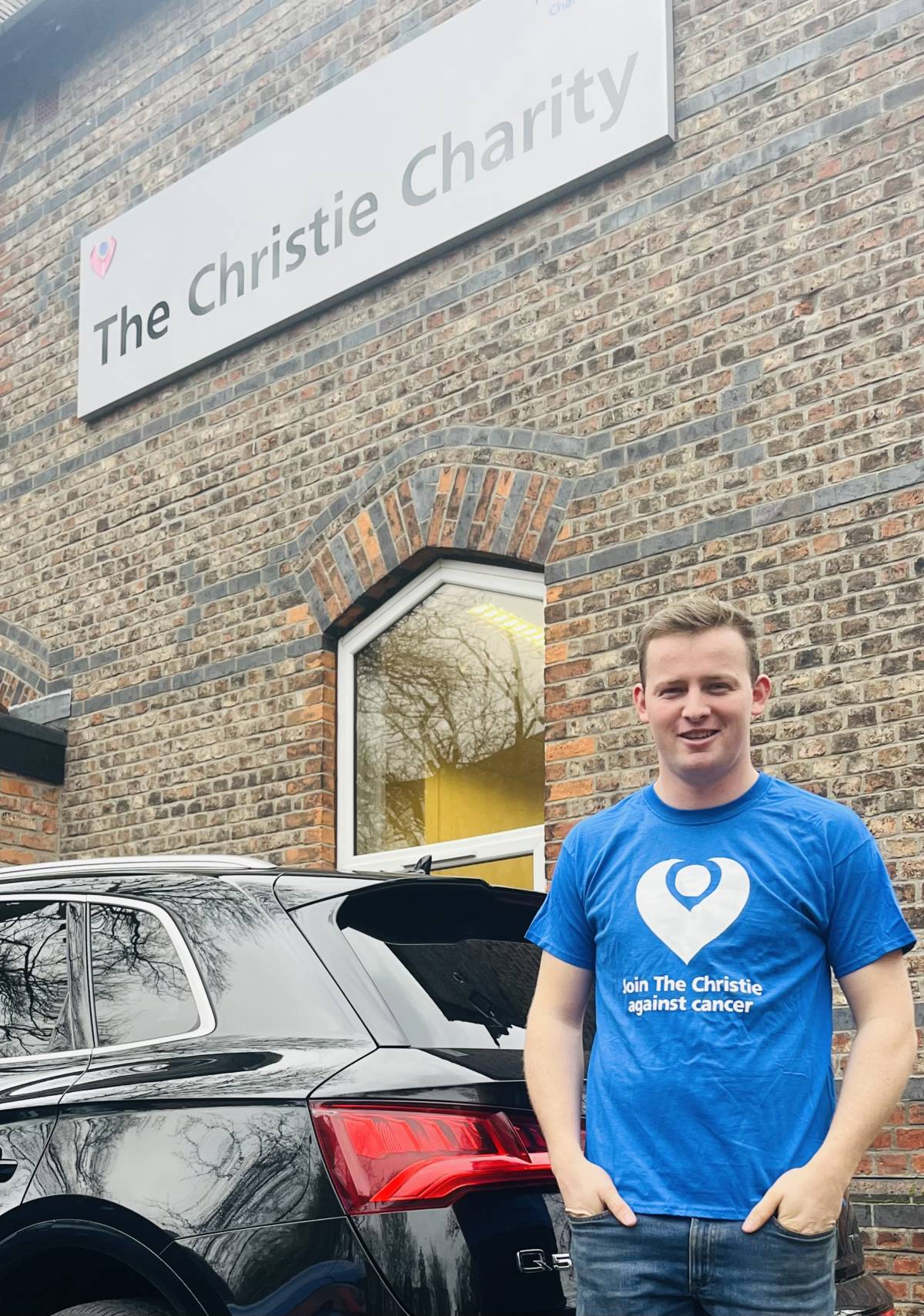 Ferguson outside charity building