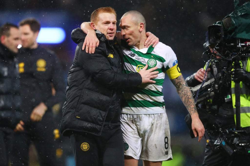 Neil Lennon and Scott Brown celebrate winning the League Cup with Celtic against Rangers