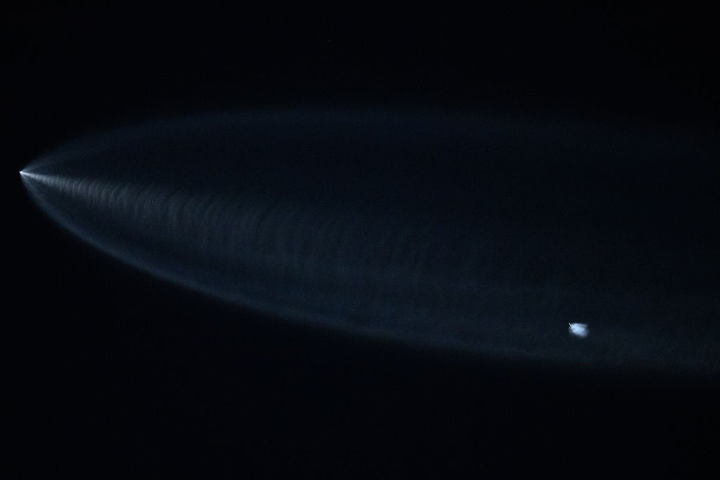 A SpaceX Falcon 9 rocket with Starlink satellites is seen above Lawndale, California after being launched from Vandenberg Space Force Base on 18 June, 2024