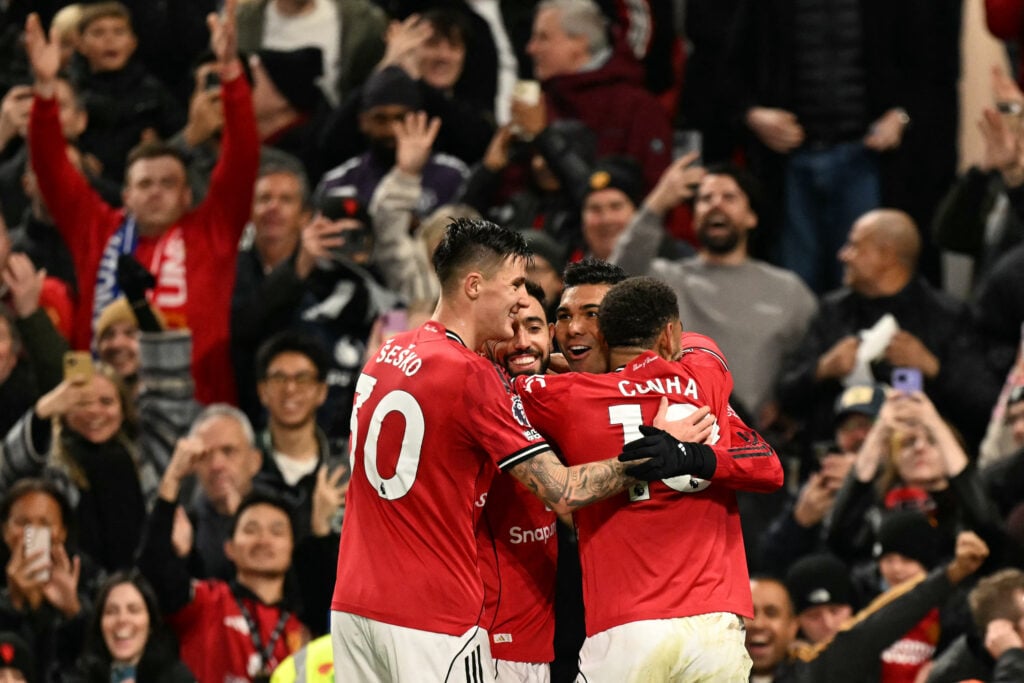 Casemiro celebrates with Bruno Fernandes, Matheus Cunha and Benjamin Sesko during the Premier League match between Manchester United and Brighton and Hove Albion at Old Trafford in Manchester, England, in 2025.