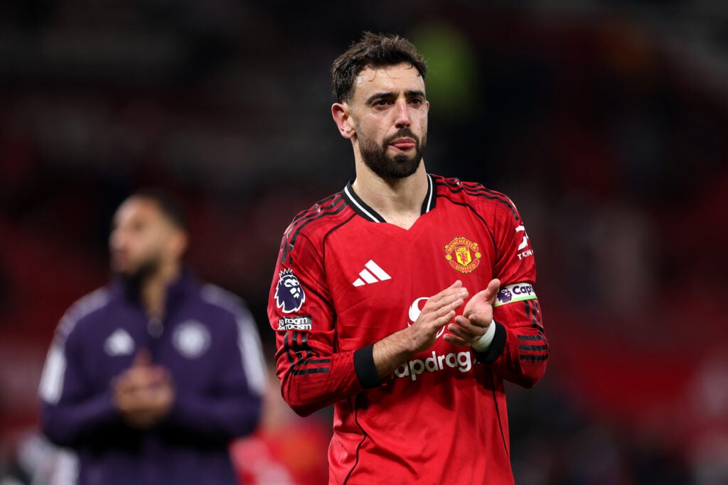 Bruno Fernandes applauds fans after Manchester United's draw with West Ham in the Premier League