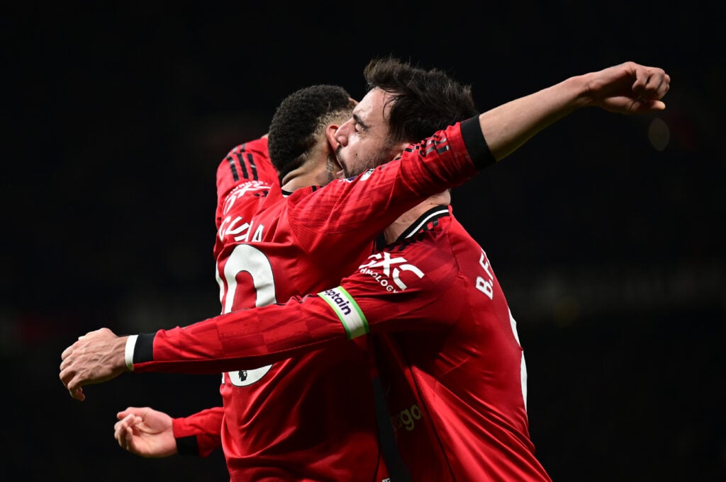 Matheus Cunha celebrates with Bruno Fernandes during the Premier League match between Manchester United and Bournemouth at Old Trafford in 2025 in Manchester, England.