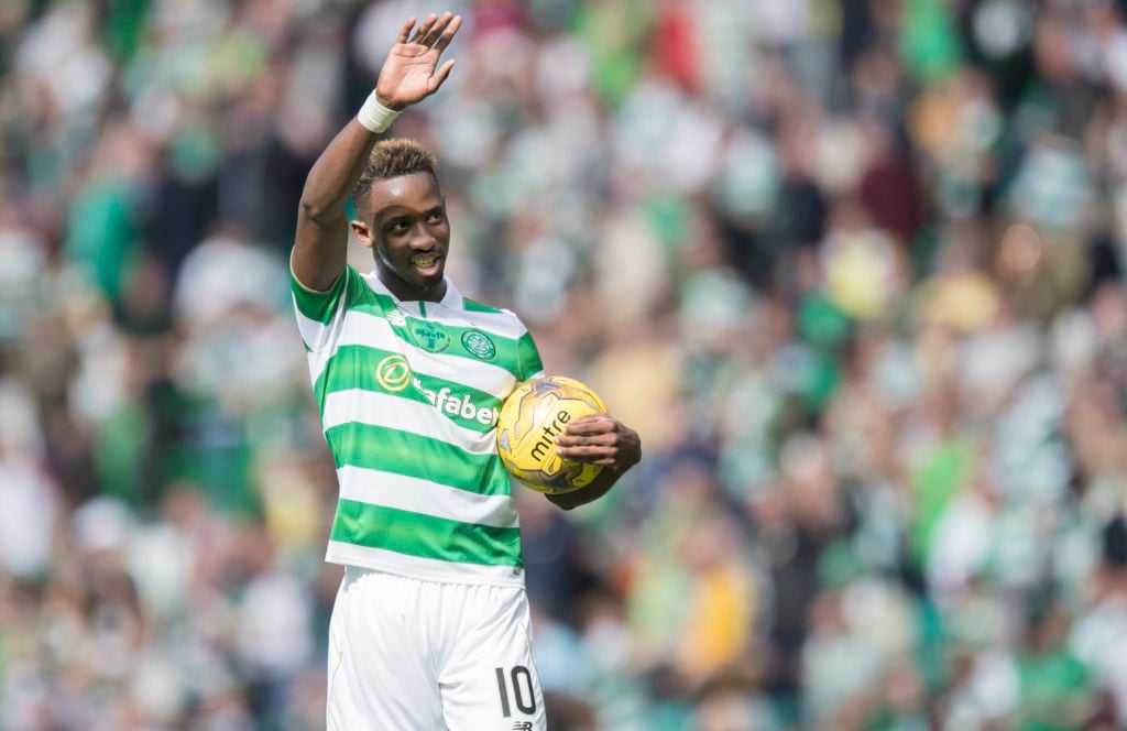 Waving Moussa Dembele of Celtic takes away the match ball having scored 3 of the 5 goals during the Ladbrokes Scottish Premiership match between Celtic and Rangers at Celtic Park