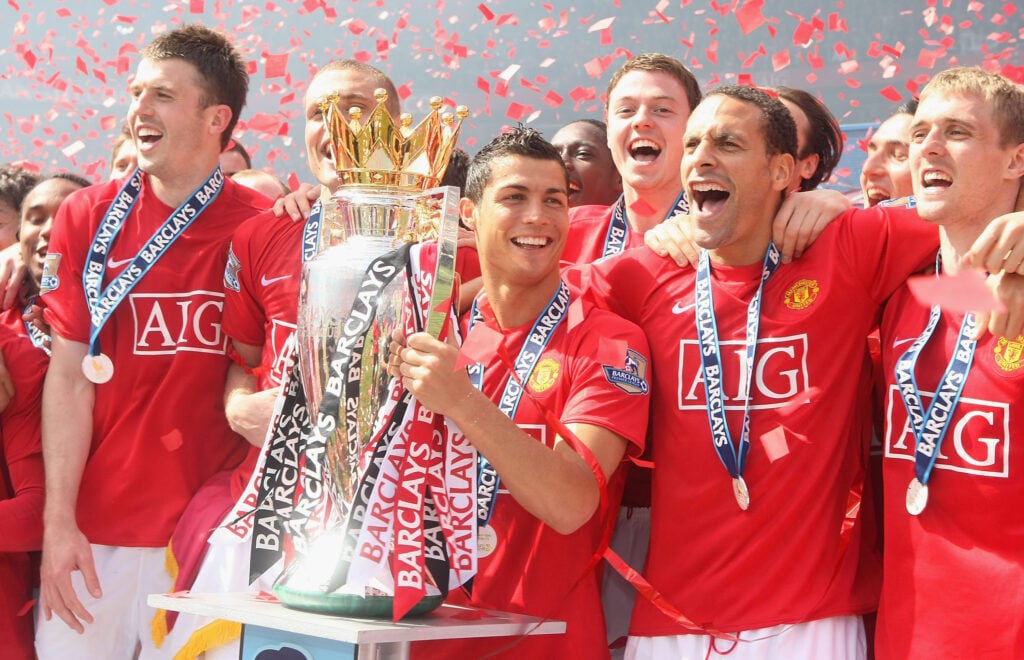 Cristiano Ronaldo lifting the Premier League trophy in 2009