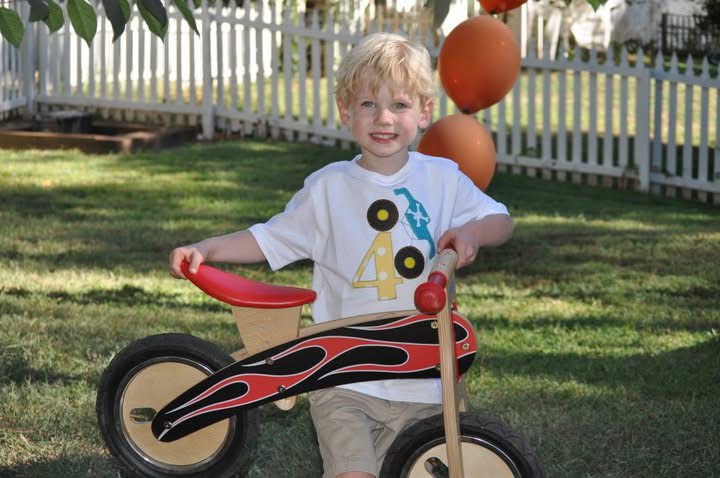 A young Ezra Caudell with his first bicycle