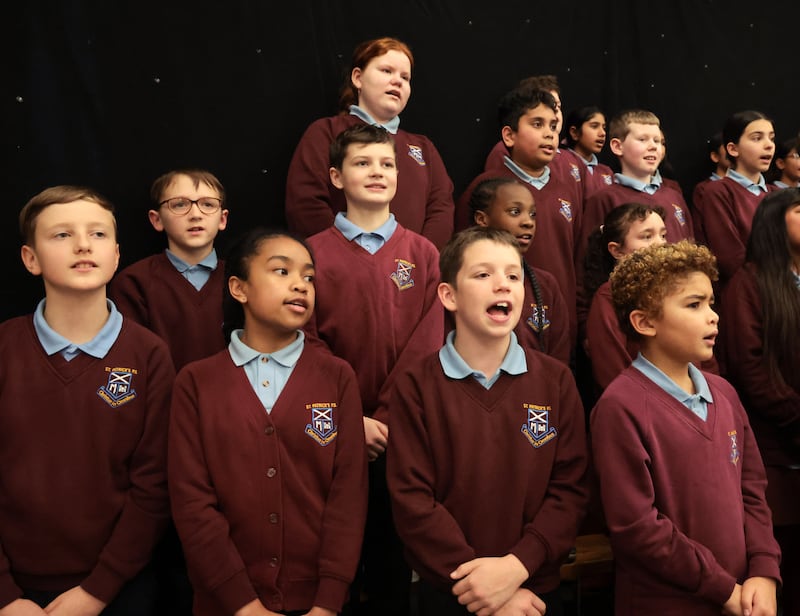 Pupils at St Patrick’s Primary School, one of the North’s most diverse primary schools, sing with the choir led by Malachi Cush. PICTURE: BRIAN LINCOLN