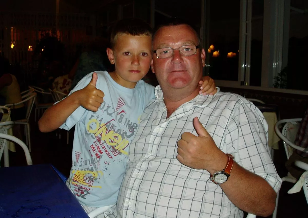 Young Evertonian Oliver King, who died aged 12, pictured alongside his dad Mark