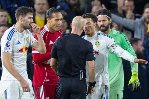 LEEDS, ENGLAND - Saturday, December 6, 2025: Liverpool's Virgil van Dijk and Leeds United's captain Ethan Ampadu speak to referee Anthony Taylor about a potential penalty for Leeds United during the FA Premier League match between Leeds United FC and Liverpool FC at Elland Road. (Photo by David Rawcliffe/Propaganda)