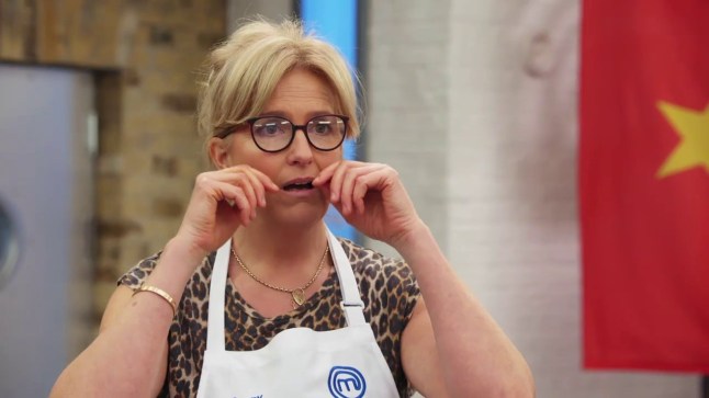 Penny Lancaster on Celebrity Masterchef Pancake scene - - she's seen casting a spell on the pancake/then you see how badly it turns out in the pan.