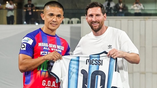Lionel Messi presented Sunil Chhetri with his signed Argentina jersey, drawing one of the loudest cheers of the night. (PTI)