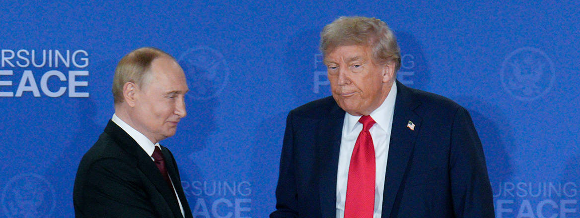 Russian President Vladimir Putin and US President Donald Trump shake hands after a joint press conference at Joint Base Elmendorf-Richardson in Anchorage, Alaska.