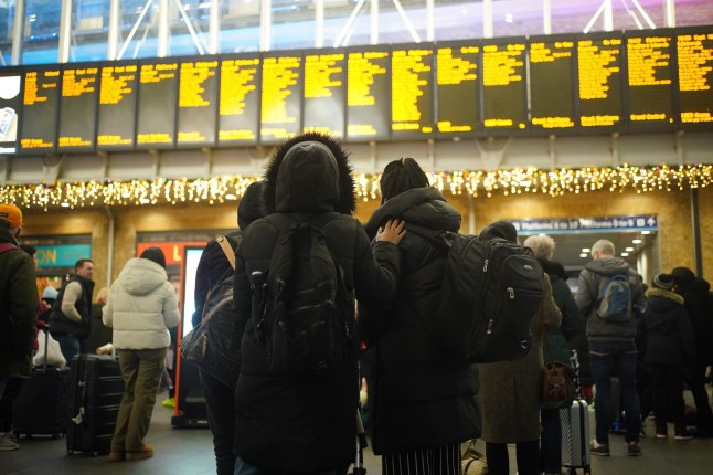 Passengers at King's Cross station in London.
