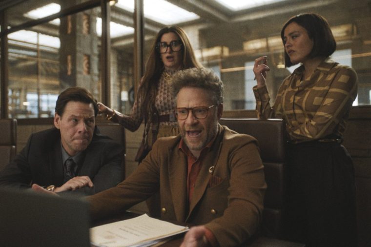 This image released by Apple TV+ shows Ike Barinholtz, from left, Kathryn Hahn, Chase Sui Wonders and Seth Rogen in a scene from "The Studio." (Apple TV+ via AP)