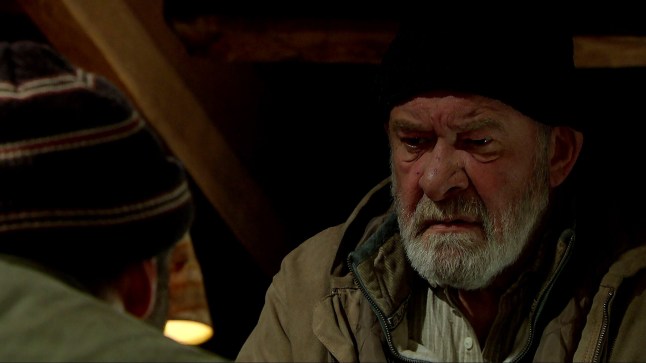 Bear Wolf looking sad in Emmerdale, as he sits in a barn attic.