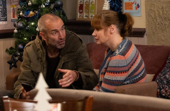 Sam and Lydia chat in the cafe in Emmerdale