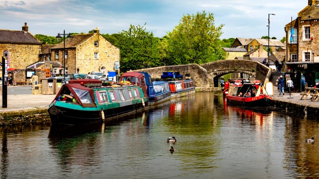 Narrow boats in the canal basin at Skipton, Yorkshire, England.