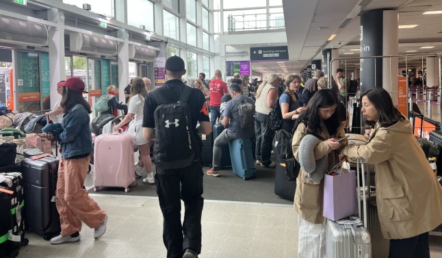 EDINBURGH, SCOTLAND - JULY 19: A general view from Edinburgh Airport as passengers gather and wait due to the global communications outage caused by CrowdStrike, which provides cyber security services to US technology company Microsoft, on July 19, 2024 in Edinburgh, Scotland. (Photo by Oguz Kagan Meydan/Anadolu via Getty Images)
