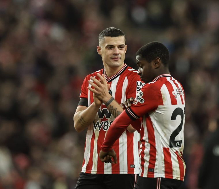 SUNDERLAND, ENGLAND - DECEMBER 14: Sunderland's Granit Xhaka celebrates with Noah Sadiki at the end of the match during the Premier League match between Sunderland and Newcastle United at Stadium of Light on December 14, 2025 in Sunderland, England. (Photo by Lee Parker - CameraSport via Getty Images)