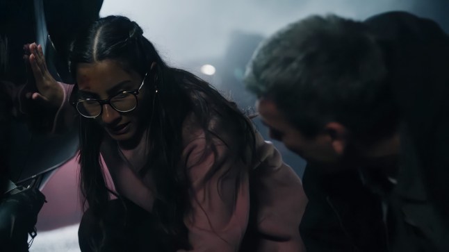 Asha assists Cain in the middle of a car crash in Corriedale