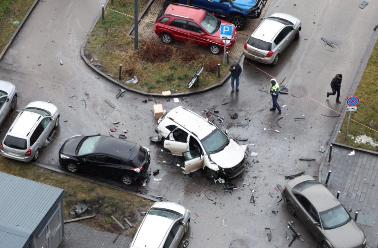 The damaged Kia Sorento lies at the scene where Lieutenant General Fanil Sarvarov, head of the Russian General Staff's army operational training directorate, was killed in a car bomb in Moscow, Russia, December 22, 2025. REUTERS/Anastasia Barashkova TPX IMAGES OF THE DAY