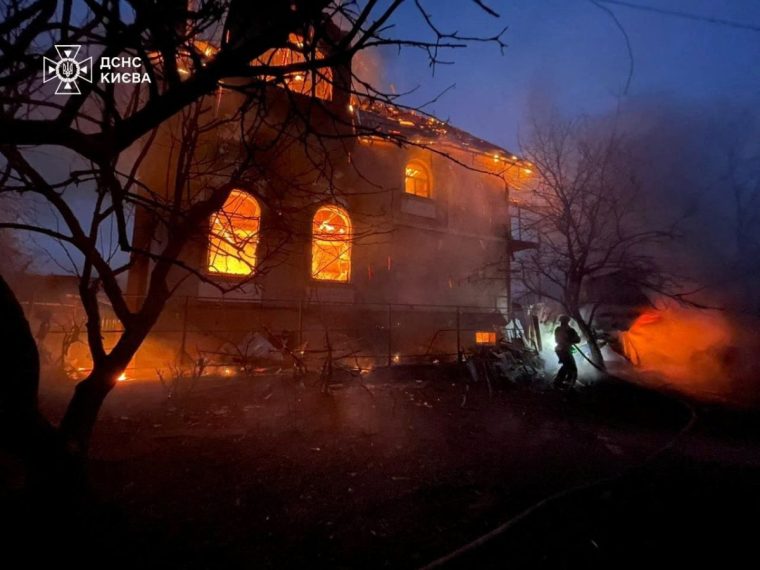 A firefighter works at the site of a residential building damaged during Russian missile and drone strikes, amid Russia's attack on Ukraine, in Kyiv, Ukraine December 27, 2025. Press service of the State Emergency Service of Ukraine/Handout via REUTERS ATTENTION EDITORS - THIS IMAGE HAS BEEN SUPPLIED BY A THIRD PARTY. DO NOT OBSCURE LOGO.